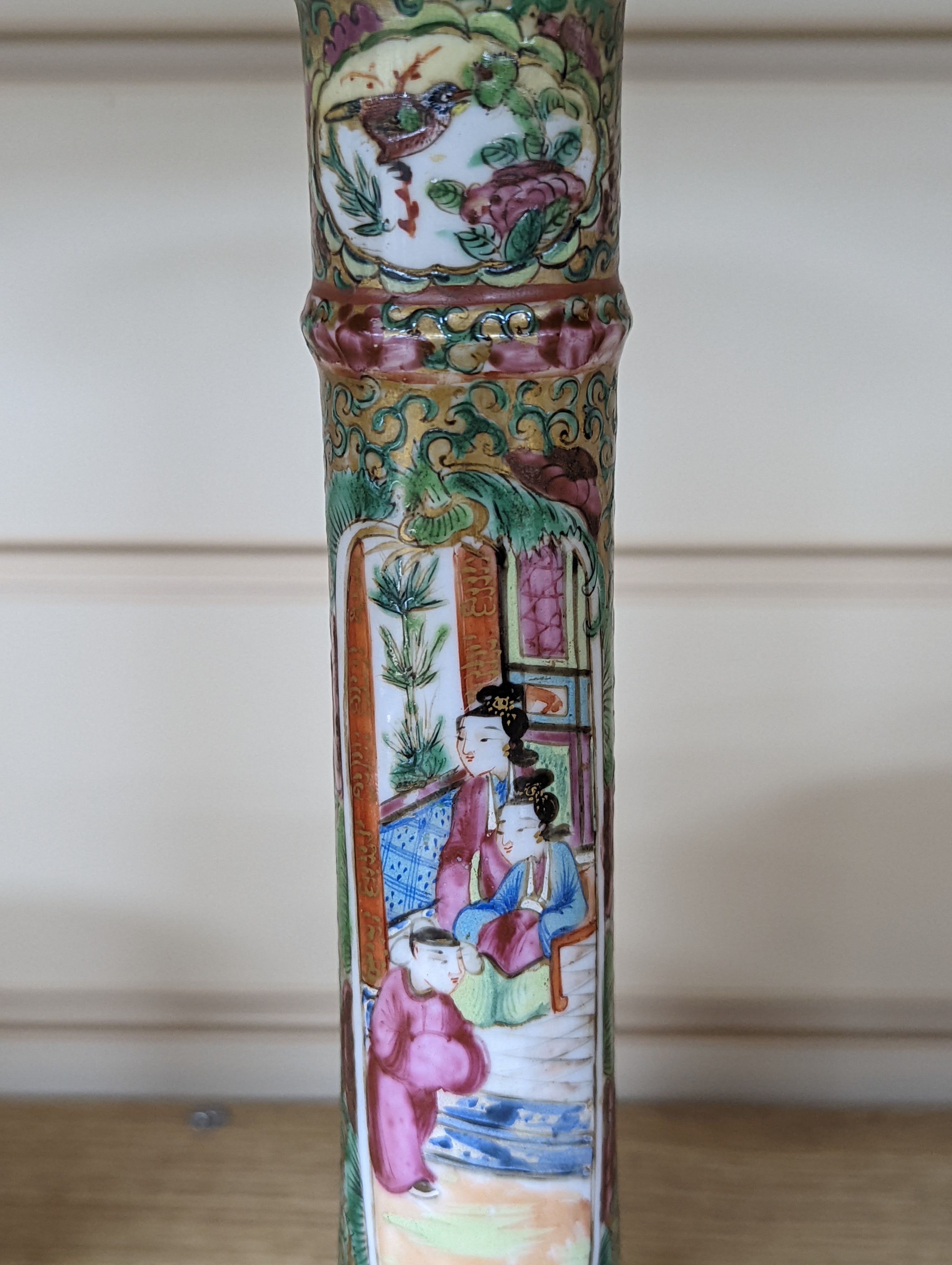 A Chinese Canton famille rose nest of boxes and covers, a similar candlestick and a tray 23cm